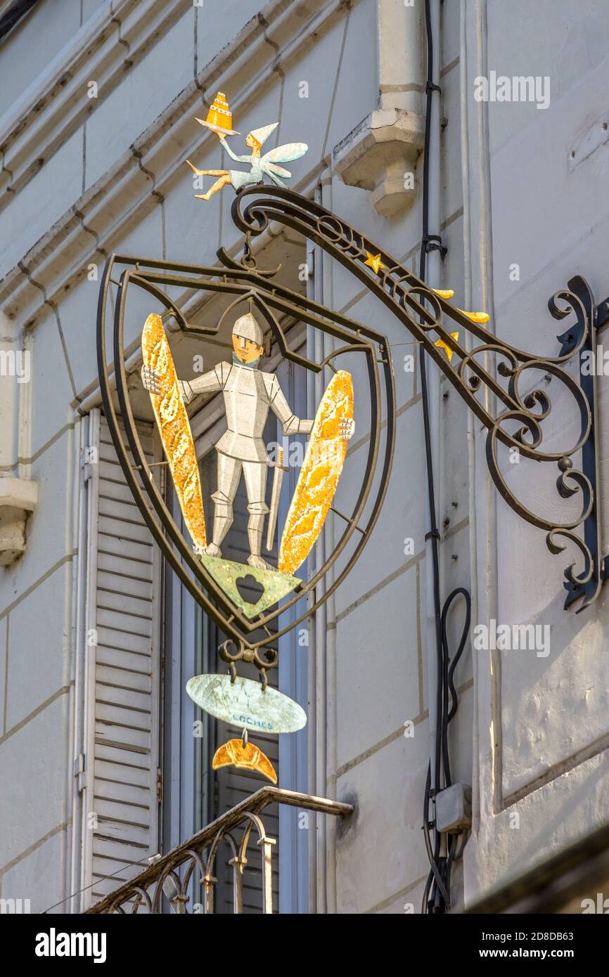 Ornate hanging sign above bakery shop in Loches, Indre-et-Loire, France. Stock Photo