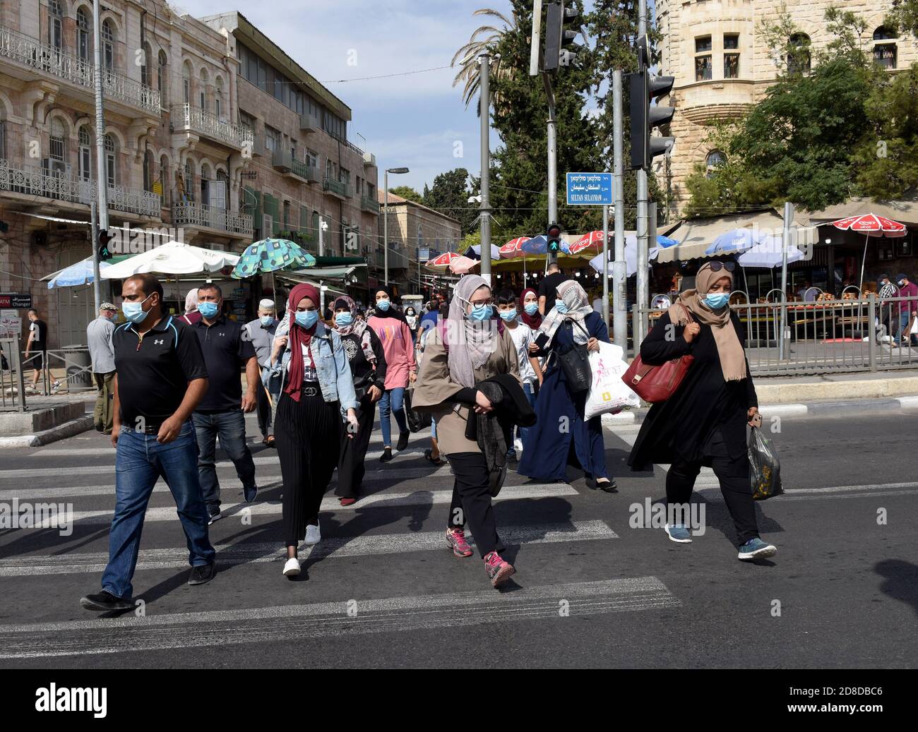 Jerusalem, Israel. 29th Oct, 2020. Palestinian Muslims wear protective masks as they walk to the Old City of Jerusalem to celebrate the birthday of the Prophet Muhammad on Thursday, October 29, 2020. Photo by Debbie Hill/UPI Credit: UPI/Alamy Live News Stock Photo