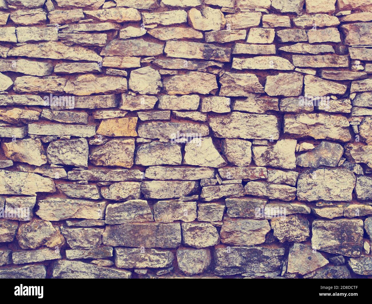Old brick stone wall background, instagram style Stock Photo - Alamy