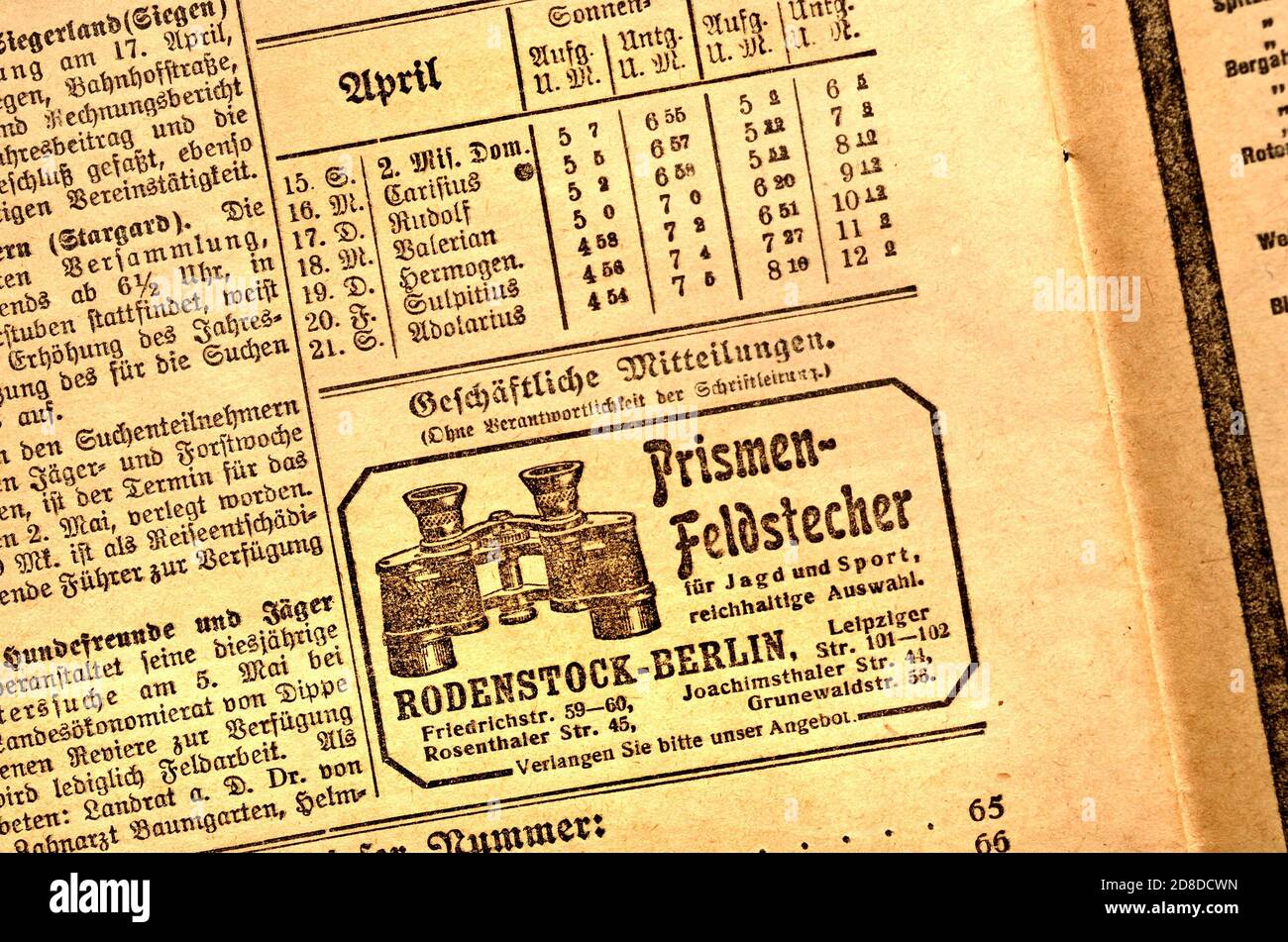 German document: Hunters' Newspaper / magazine: Deutsche Jaeger Zeitung (April 1923) classified ads at the back - Rodenstock binoculars, and a table.. Stock Photo