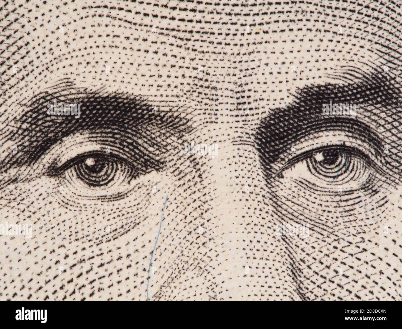 Abraham Lincoln eyes extreme macro on US 5 dollar bill, united states money closeup, 2003 series Stock Photo
