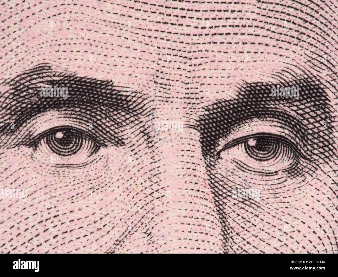 Abraham Lincoln eyes extreme macro onUS 5 dollar bill, united states money closeup, 2013 series Stock Photo