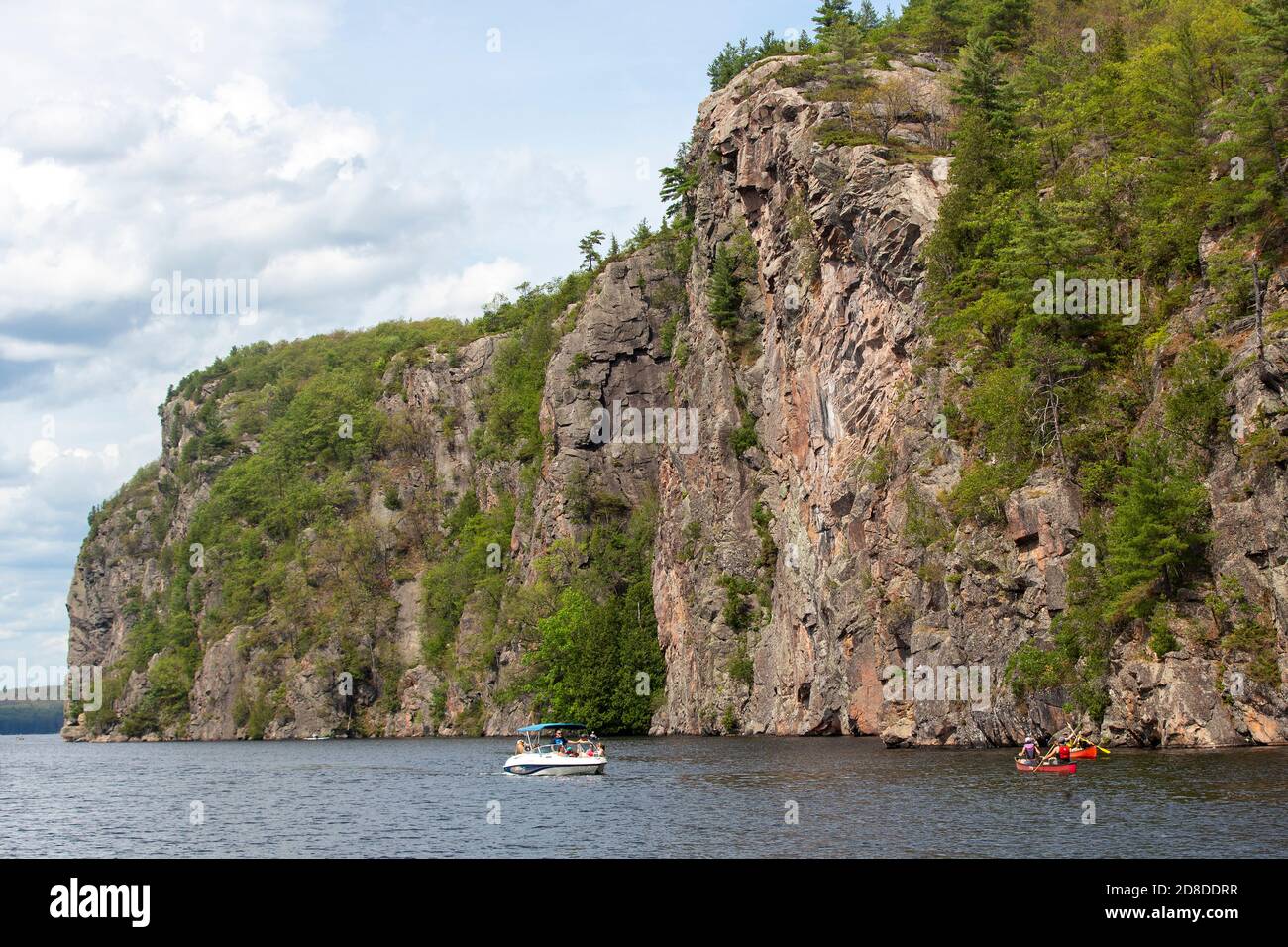 People swim in the Mazinaw lake at the Bon Echo Provincial Park in