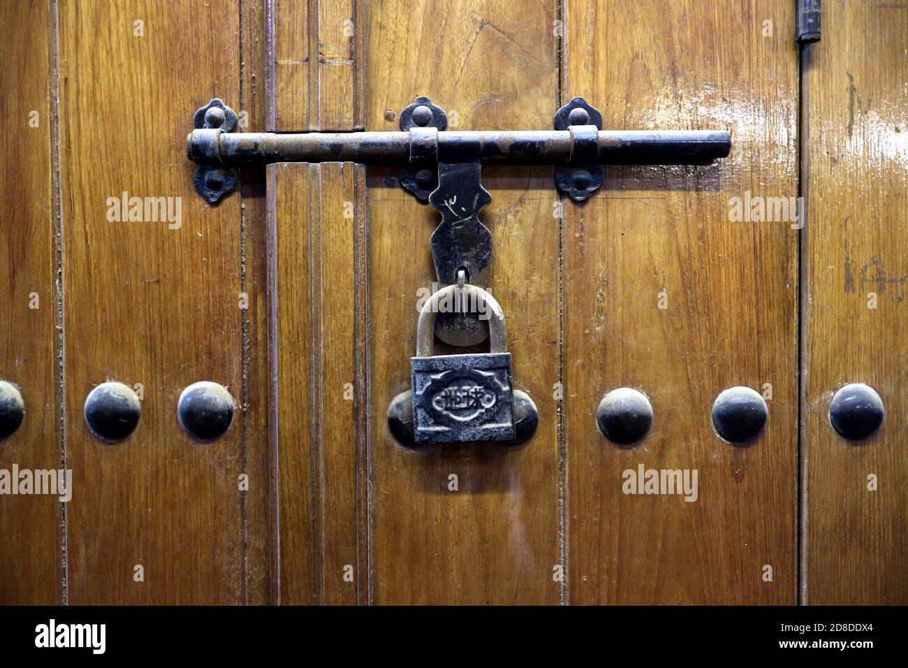 Wood door with latch an padlock Stock Photo