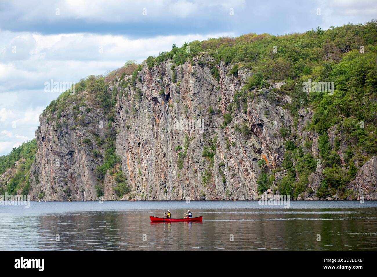 People swim in the Mazinaw lake at the Bon Echo Provincial Park in
