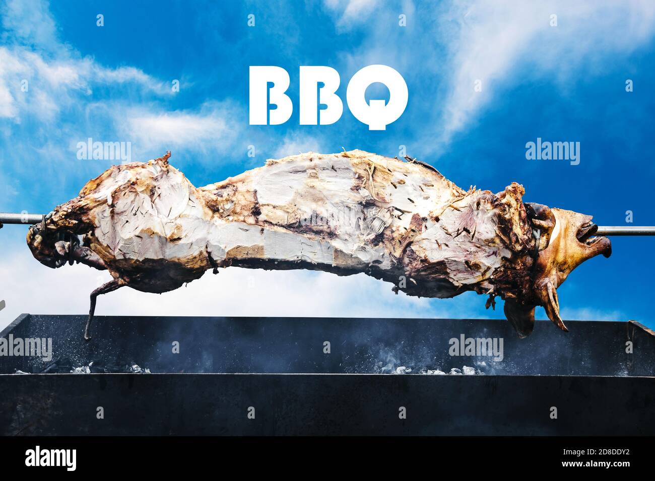 pig on the spit cooked on the grill, BBQ concept Stock Photo