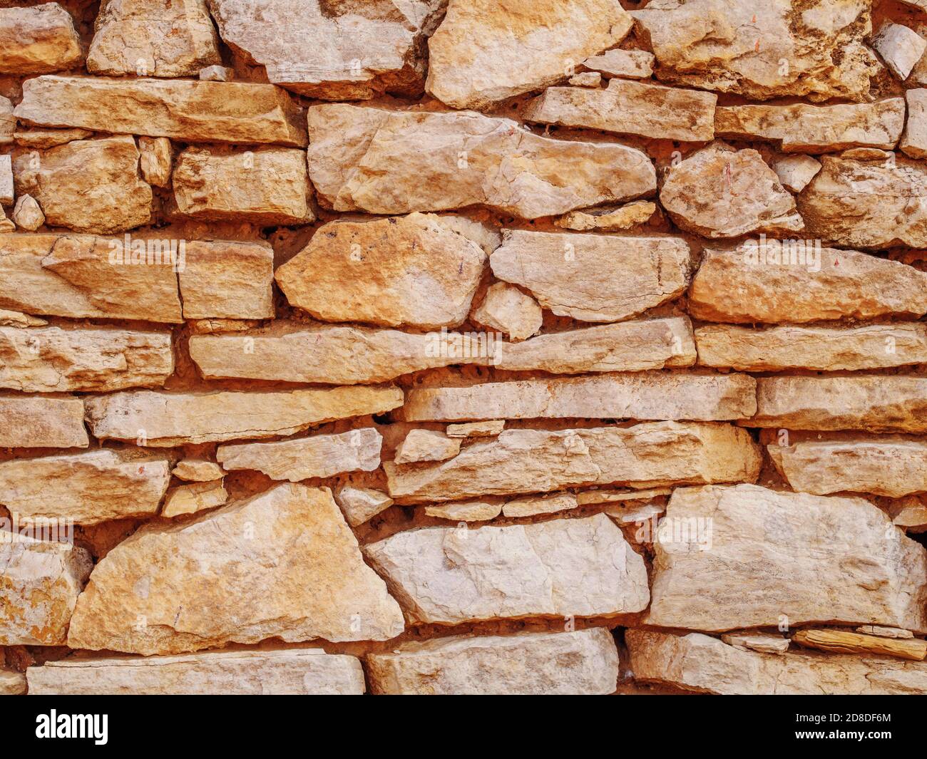 Old mediterranean rubble stone wall background, instagram retro style  filtered Stock Photo - Alamy