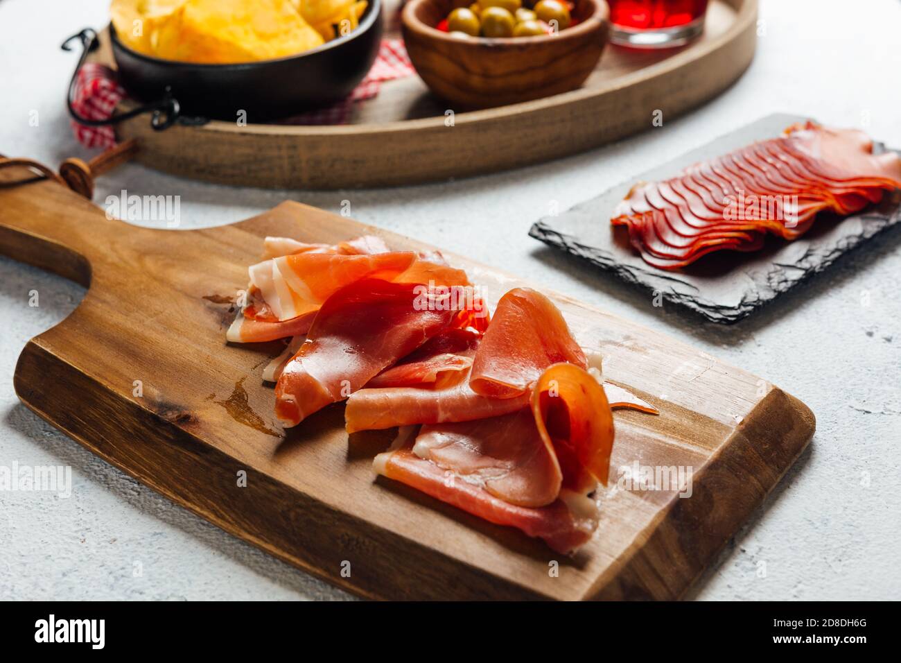 Pictures of typical Spanish food snacks (tapas). Composed of Sangria, iberian ham, manchego