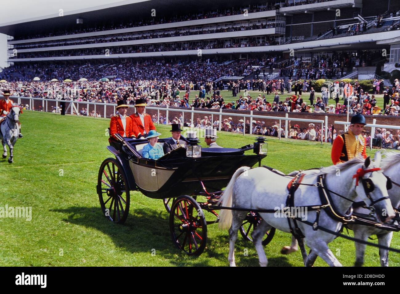 HM Queen Elizabeth II and Prince Philip Duke of Edinburgh arriving at Royal Ascot races in a royal carriage, landaus. Berkshire, England. 1989 Stock Photo