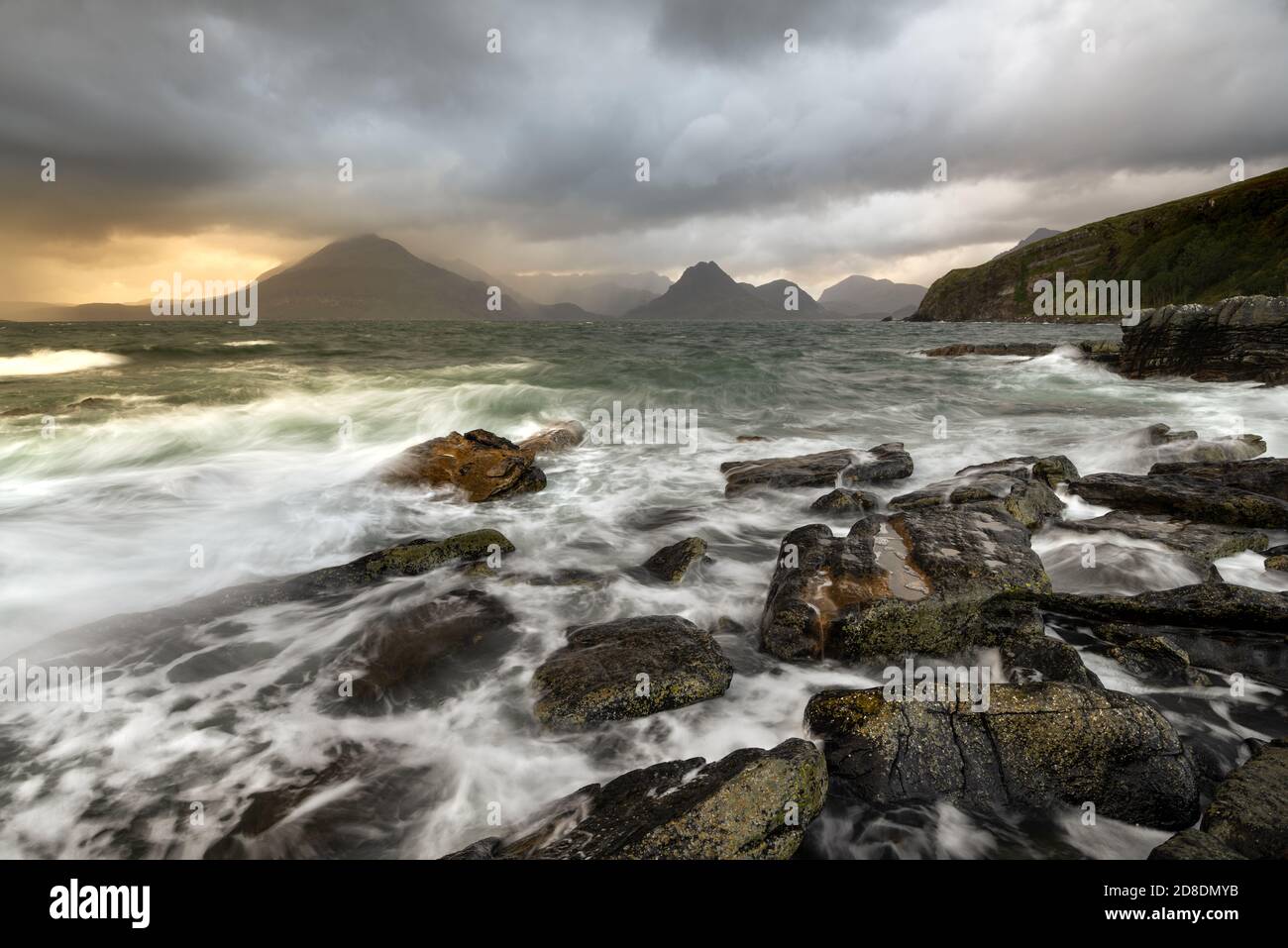 Rough waves crashing on rocky shoreline at Elgol on the Isle of Skye, Scotland, UK. Stock Photo