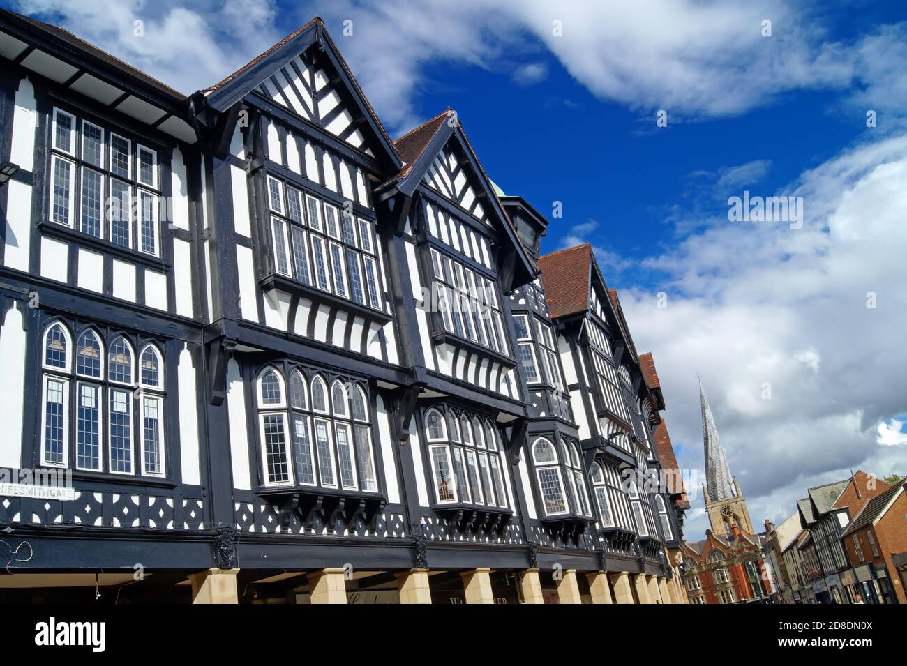 UK, Derbyshire, Chesterfield, Tudor Style Buildings on Knifesmithgate and the Crooked Spire Church Stock Photo