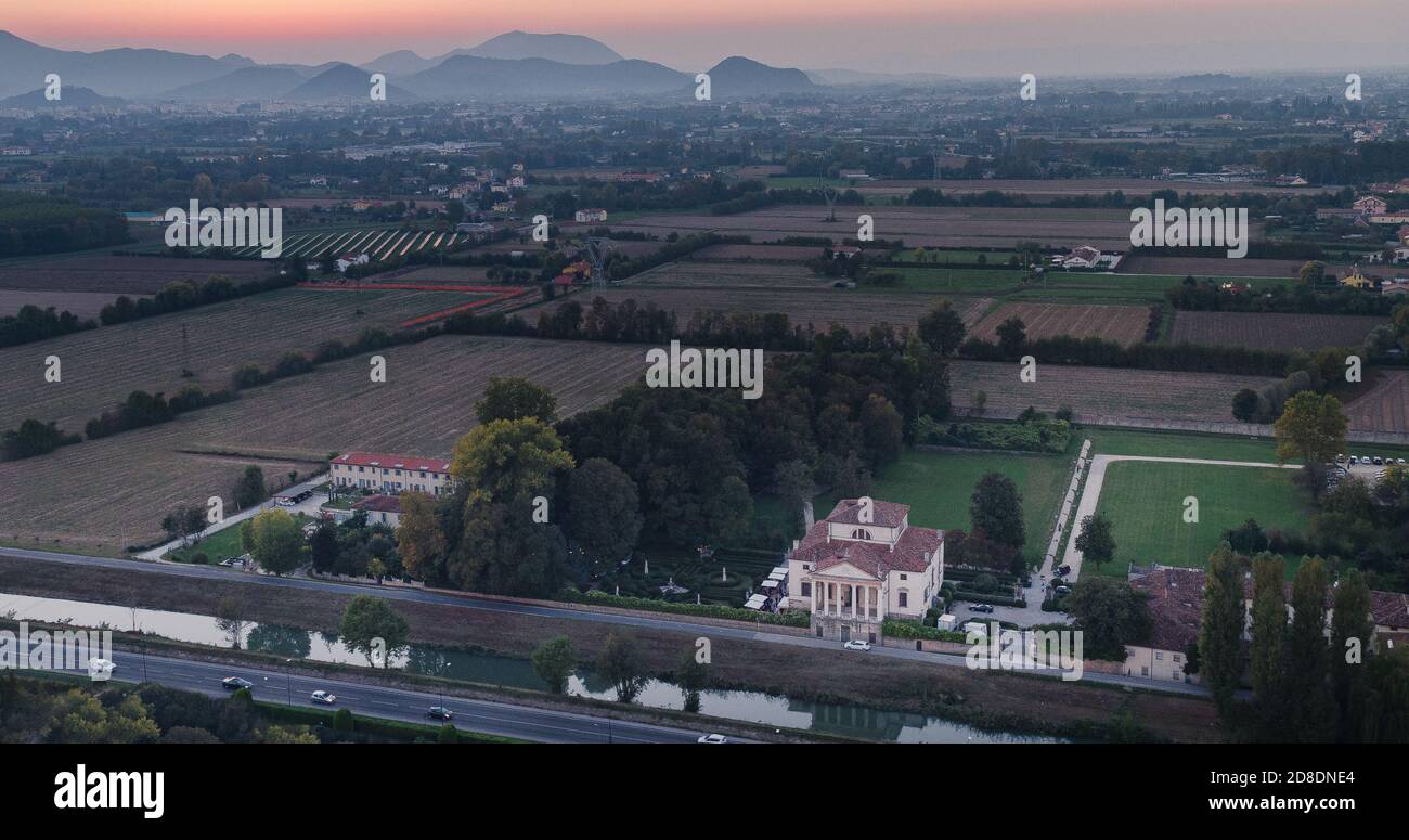 Aerial view of a Venetian villa close to Padova, north of Italy, pink sunset on the hills Stock Photo