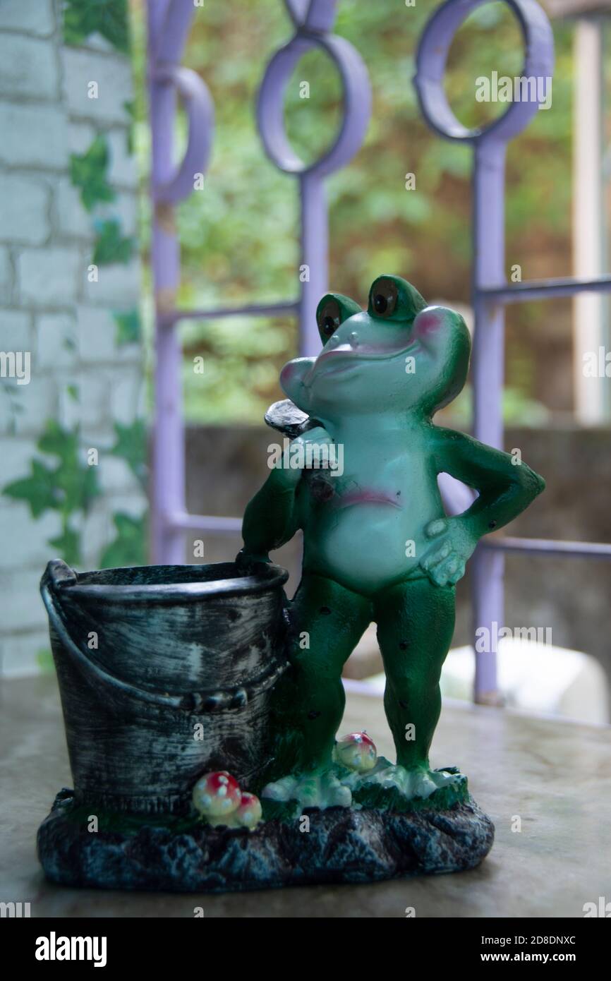 showpiece of frog made by stone Stock Photo