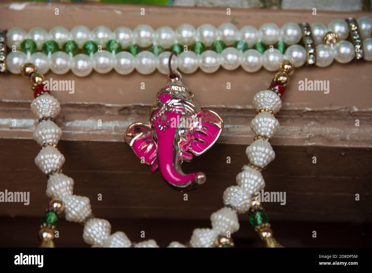 head of ganesha hanging on door is very lucky charms Stock Photo