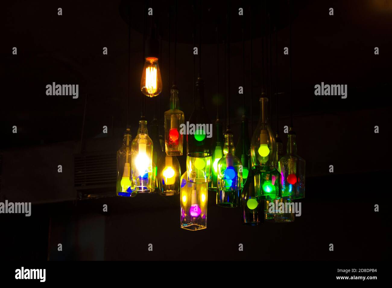 Coloured Lights Inside The Wine Bottle Hanging Stock Photo Alamy