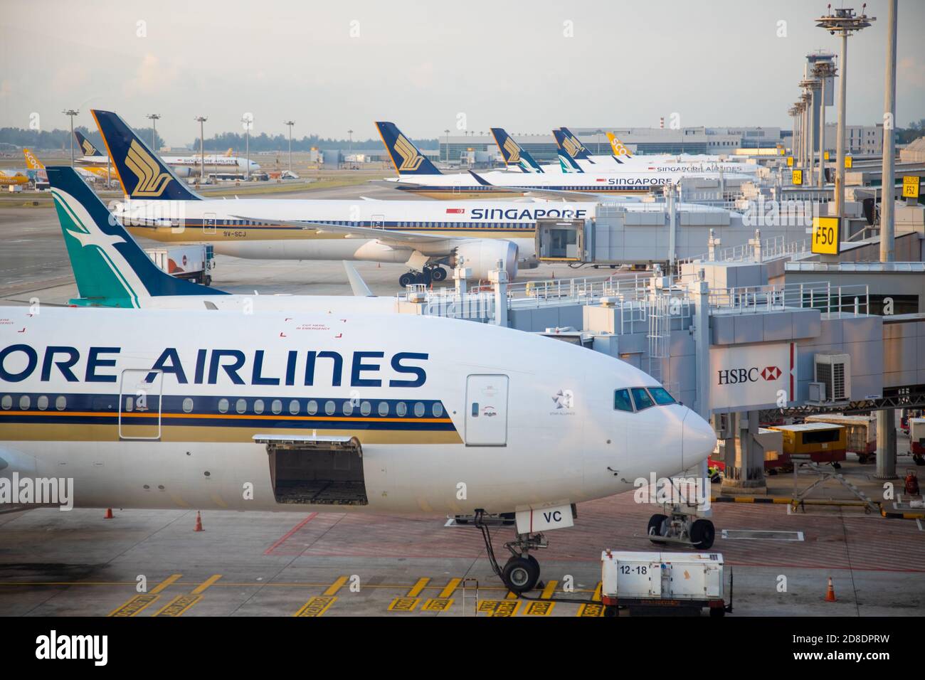 SINGAPORE - FEBRUARY 11, 2020: Singapore Airlines aircraft stand, loaded and serviced at the Jet bridge of changi airport Stock Photo