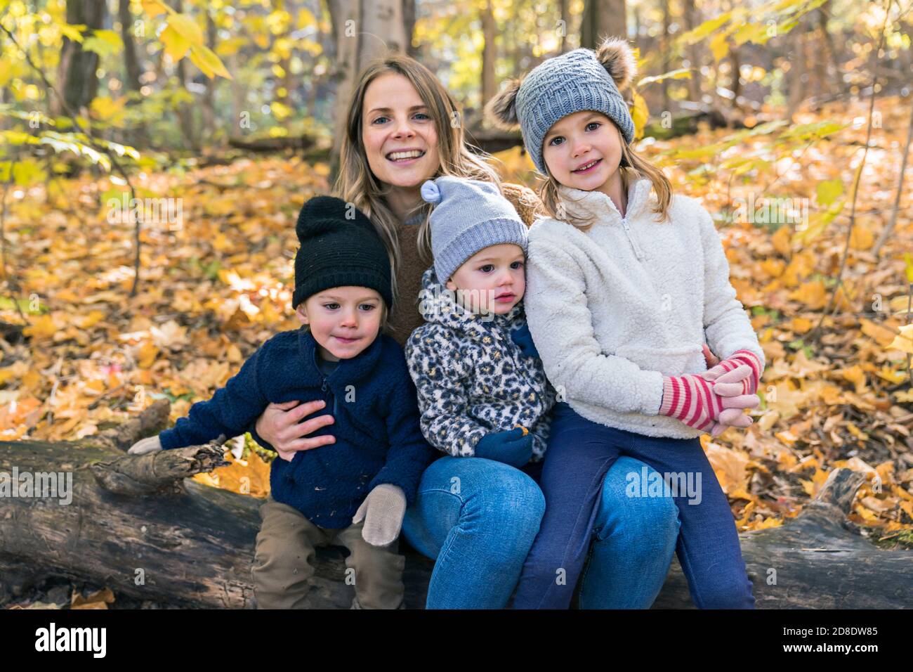 Happy family relaxing on grass hi-res stock photography and images - Alamy