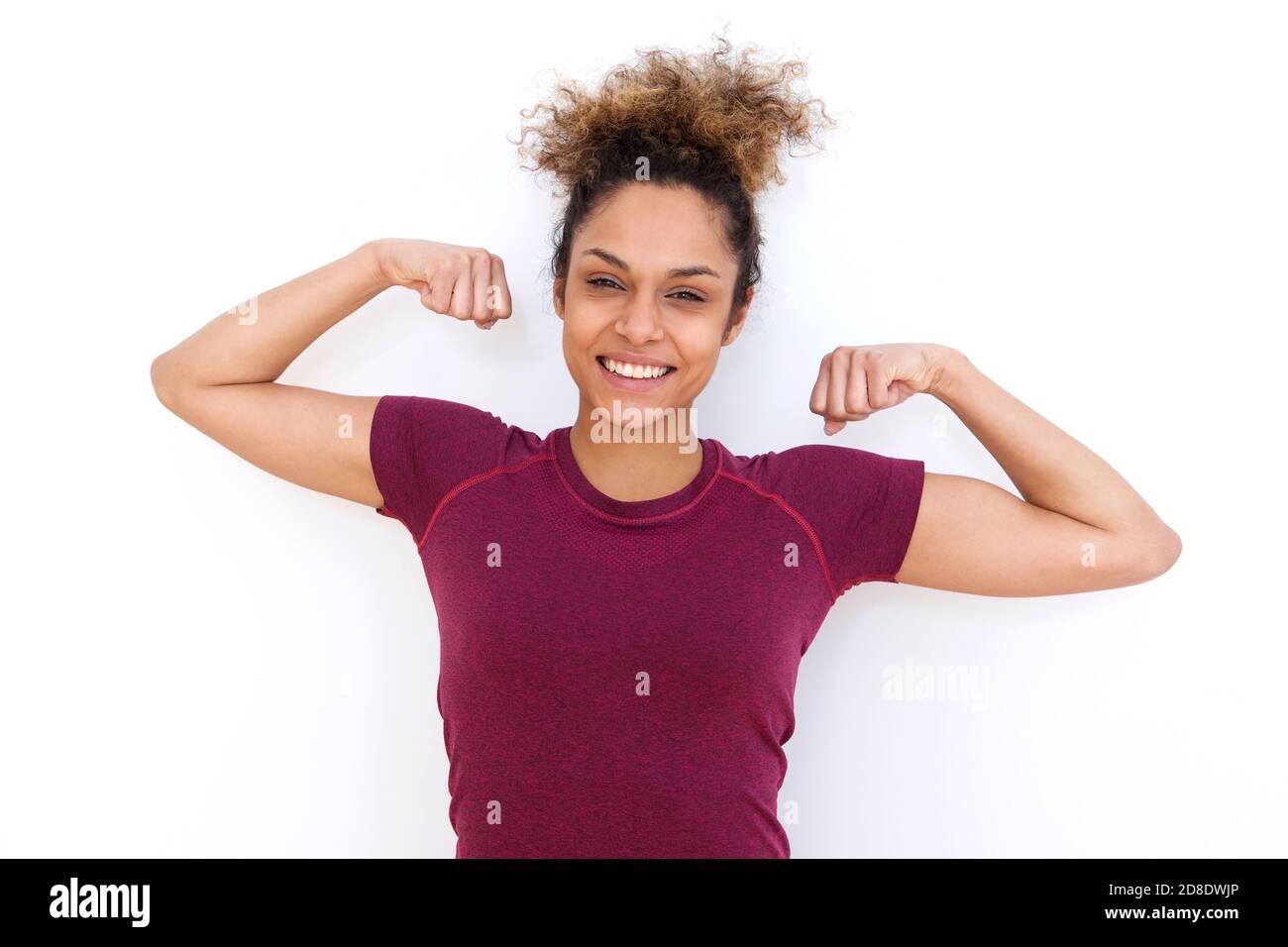 Smiling Black Woman Flexes Her Bicep Over White Background Stock Photo,  Picture and Royalty Free Image. Image 14738048.