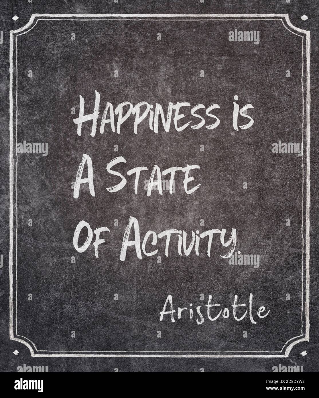Happiness is a state of activity - ancient Greek philosopher Aristotle quote written on framed chalkboard Stock Photo