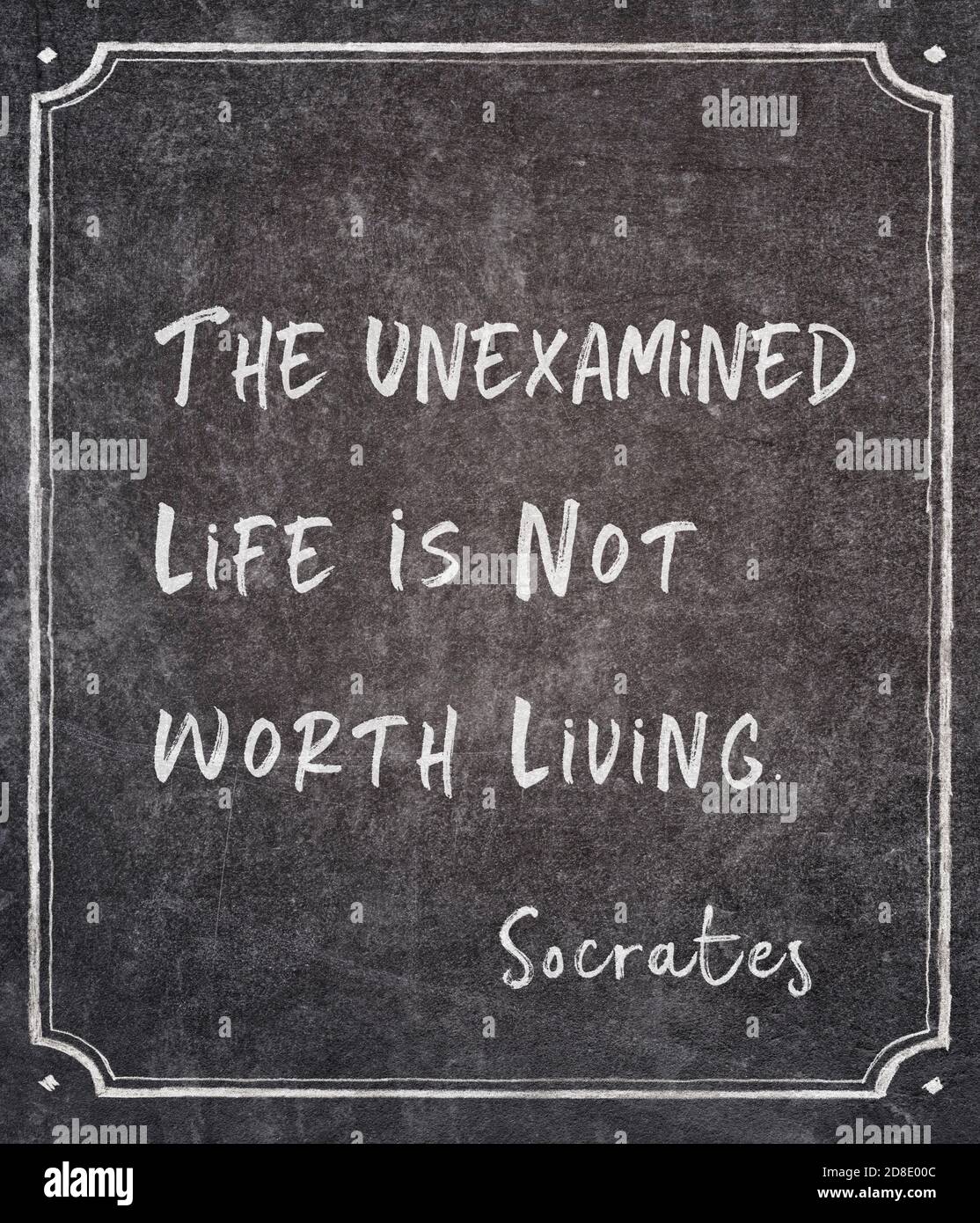 The unexamined life is not worth living - ancient Greek philosopher Socrates quote written on framed chalkboard Stock Photo