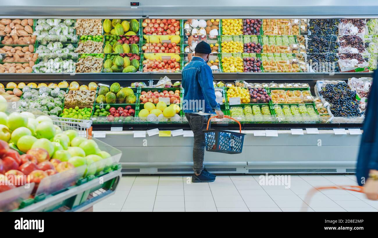 The fresh produce aisle of a Schnucks grocery store with colorful fresh  fruits and vegetables ready to be purchased by consumers. Photos