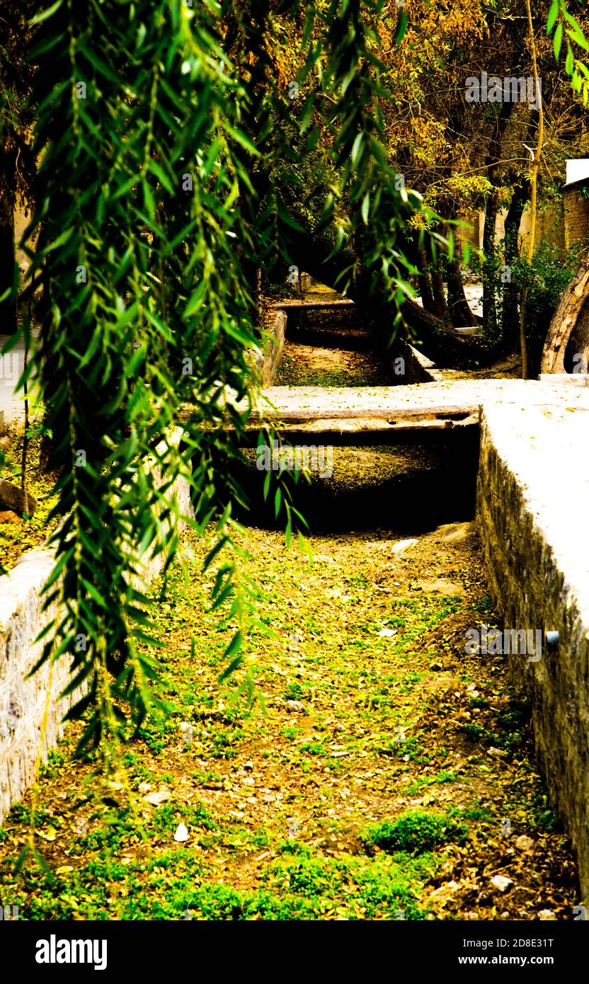 dried water tunnel or street gutter known as Madi in Isfahan used for ...