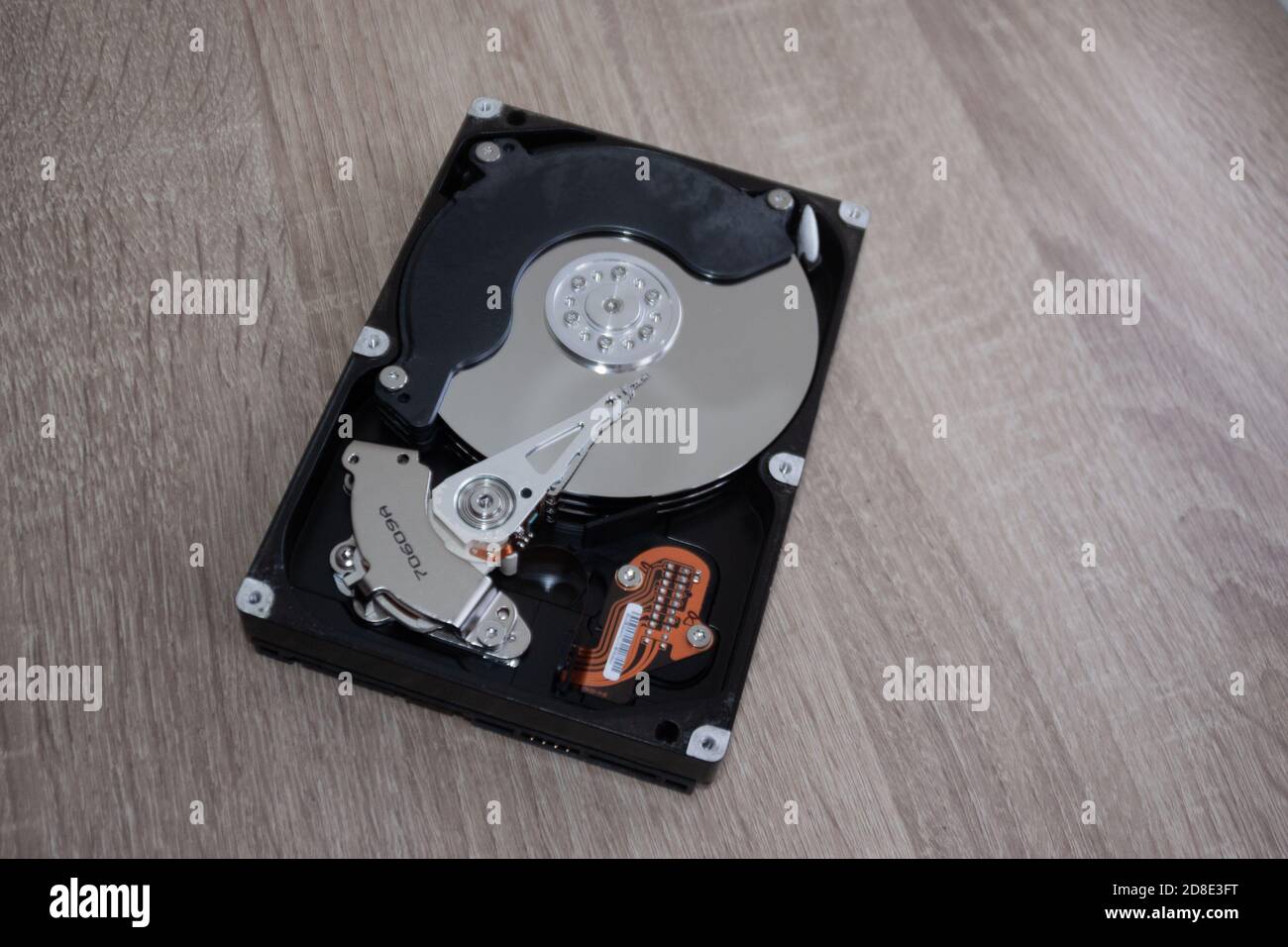 Disassembled computer hard drive device closeup. Dismantling