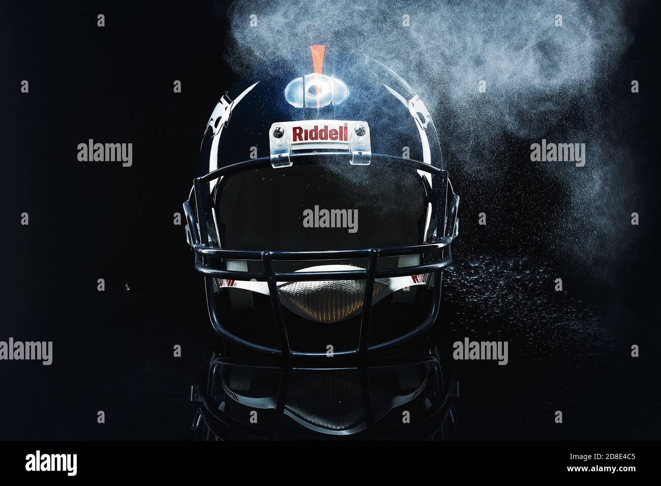 MONTERREY, MEXICO - Nov 04, 2018: MONTERREY, NL, MEXICO - 03 NOVEMBER 2018 - Denver Broncos NFL club riddell helmet replica on black background, produ Stock Photo