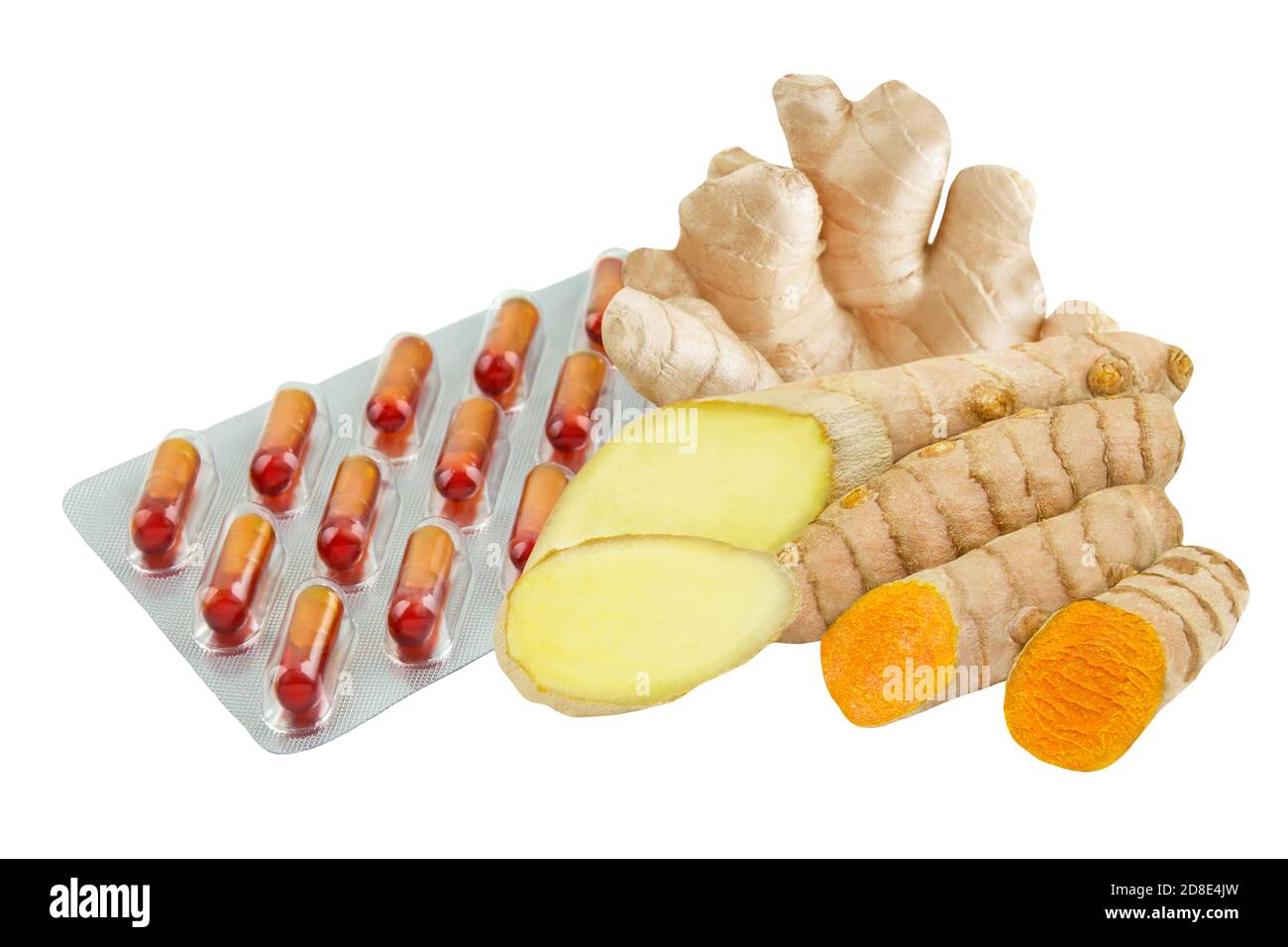 Curcuma and ginger roots capsules isolated against white background Stock Photo