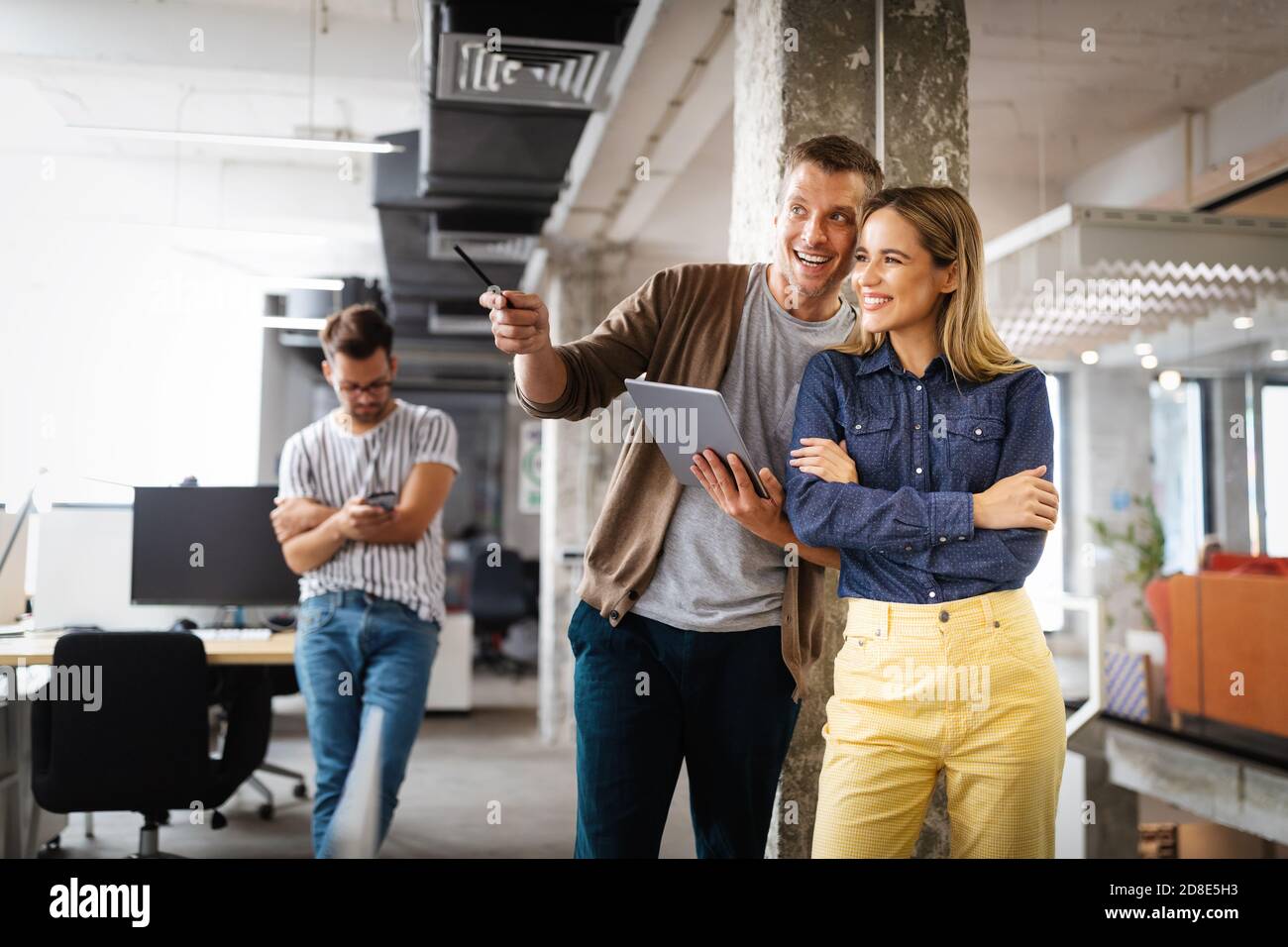 Company employees working in software development and designer office Stock Photo