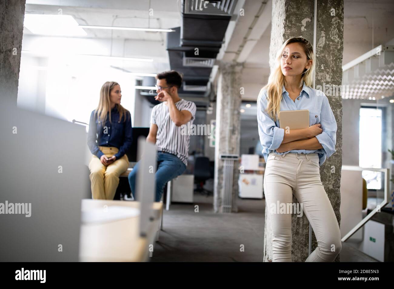 Company employees working in software development and designer office Stock Photo