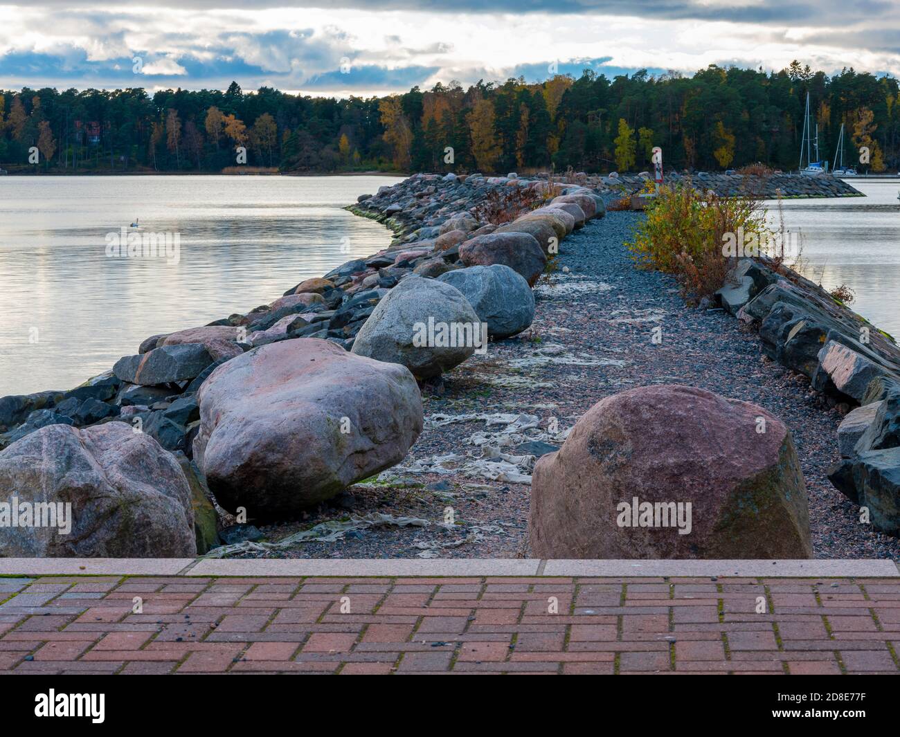 Helsinki/Finland - OCTOBER 16, 2020: A view of a large granite based break water in the leisure boat harbor. Stock Photo