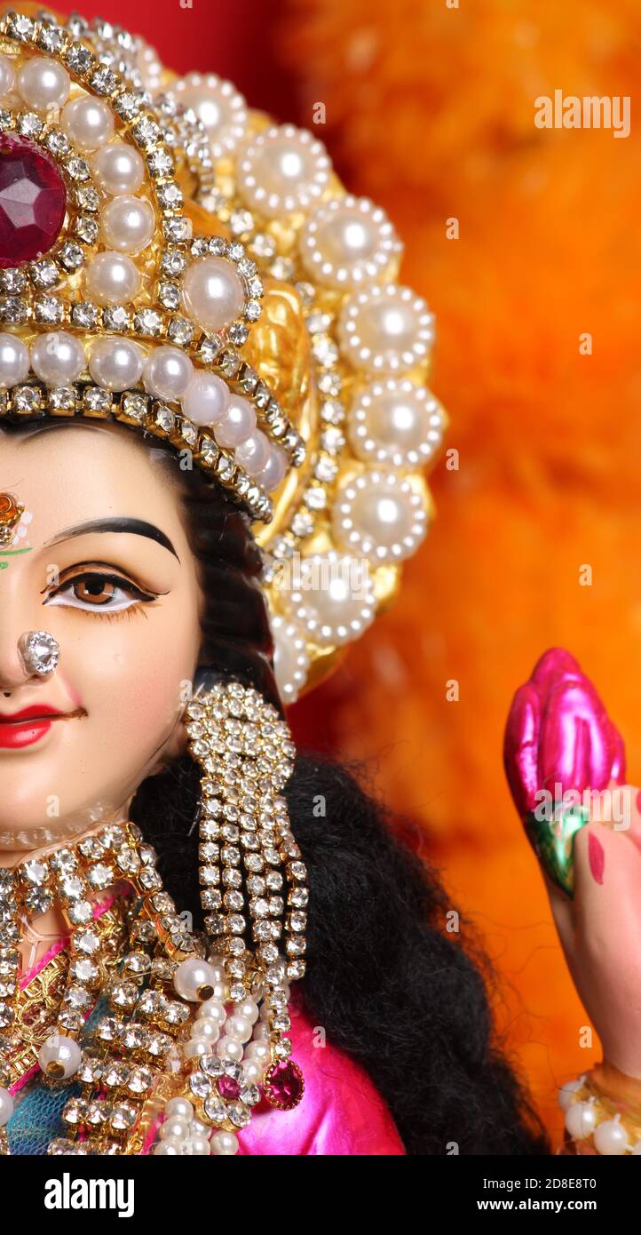 Idol worshipping of Hindu Goddess Lakshmi - Lakshmi Puja is a Hindu  religious festival that falls on Amavasya (new moon day) which is the third  day o Stock Photo - Alamy, image size:722x1390