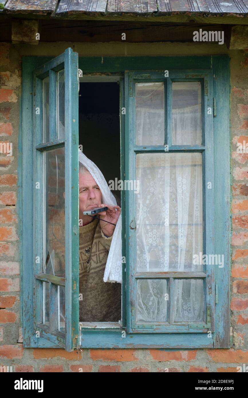 Curtain twitcher hires stock photography and images Alamy