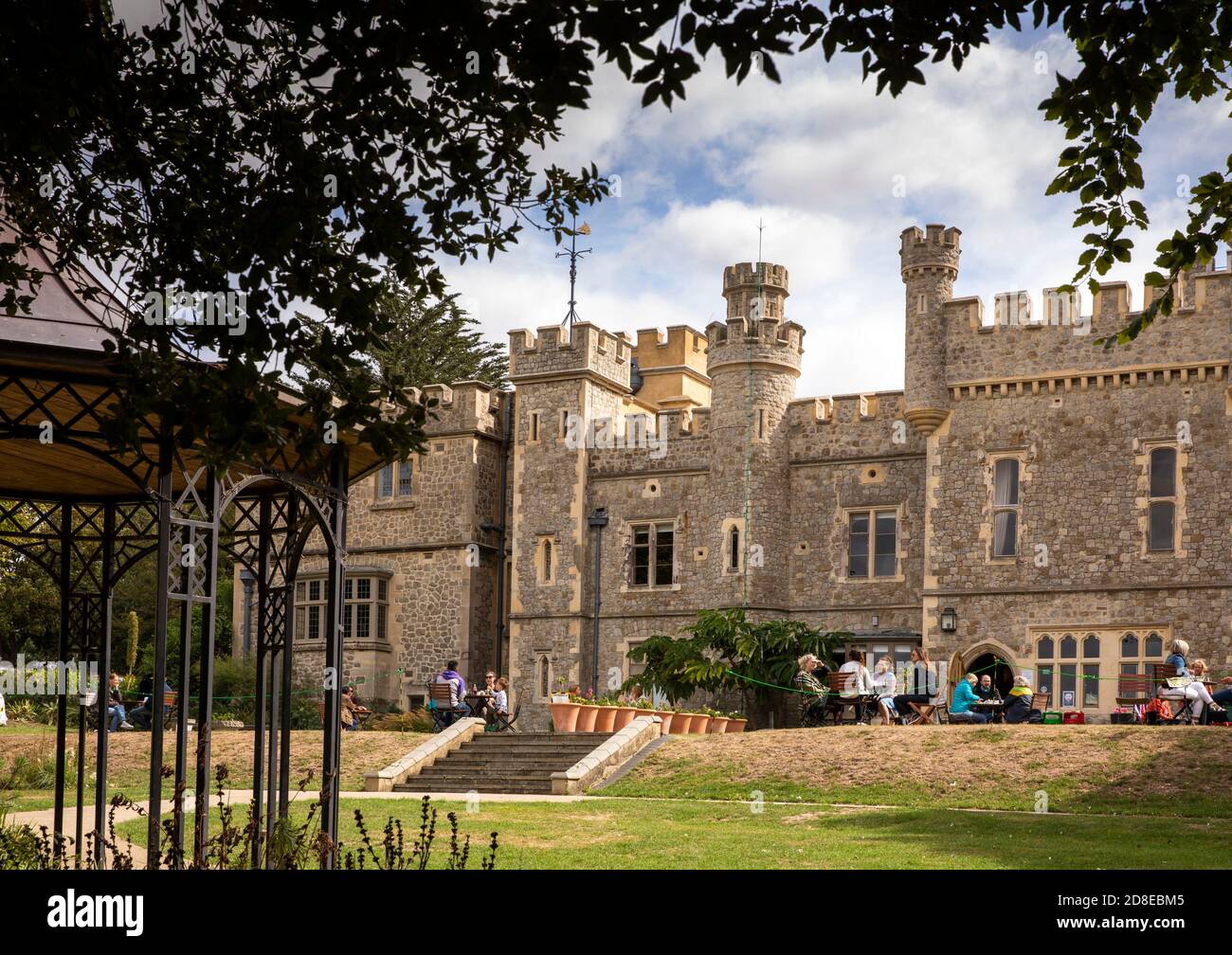 UK, Kent, Whitstable, Tower Hill, Whitstable Castle and gardens, customers on cafe lawn Stock Photo