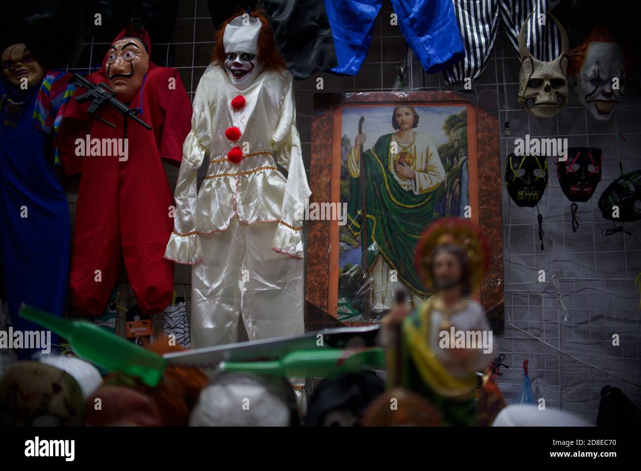 Tlaxcala, Mexico. 29th Oct, 2020. Costumes hang in a shop before the Day of the Dead and Halloween. The Day of the Dead is a big celebration in Mexico. This year, corona-related restrictions are to apply nationwide. Credit: Jesus Alvarado/dpa/Alamy Live News Stock Photo