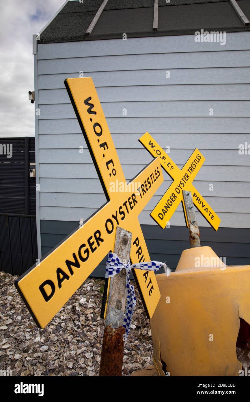 UK, Kent, Whitstable, Harbour, East Quay, yellow oyster bed warning buoys Stock Photo