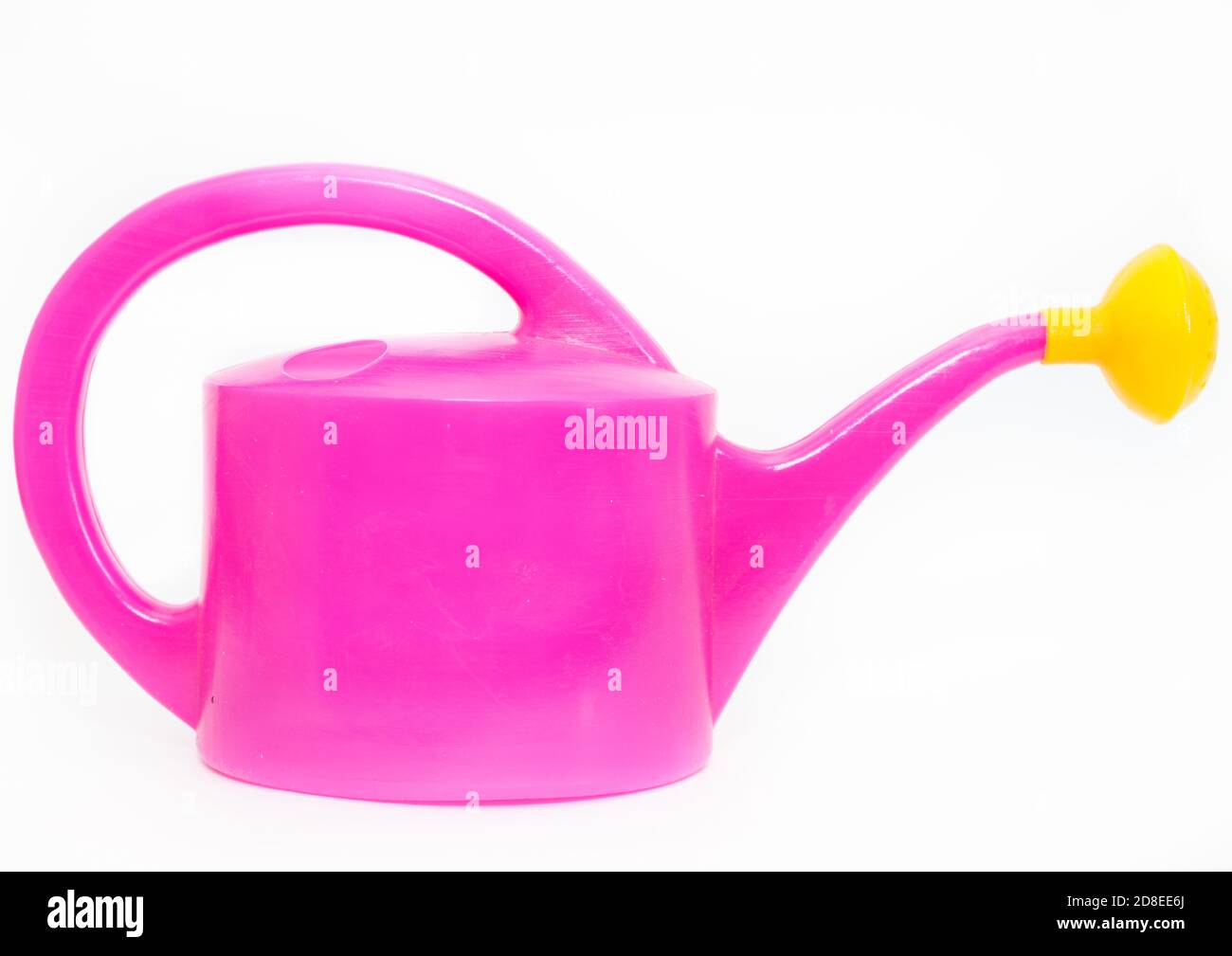 Purple watering can with yellow shower nozzle, a white background Stock