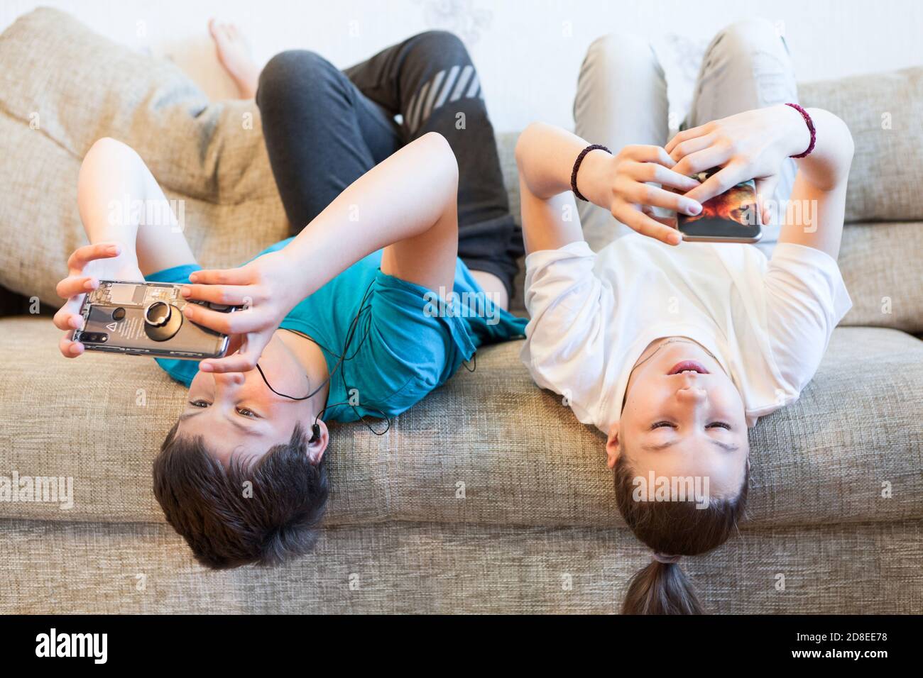 Preteen girl lying on back hi-res stock photography and images - Alamy