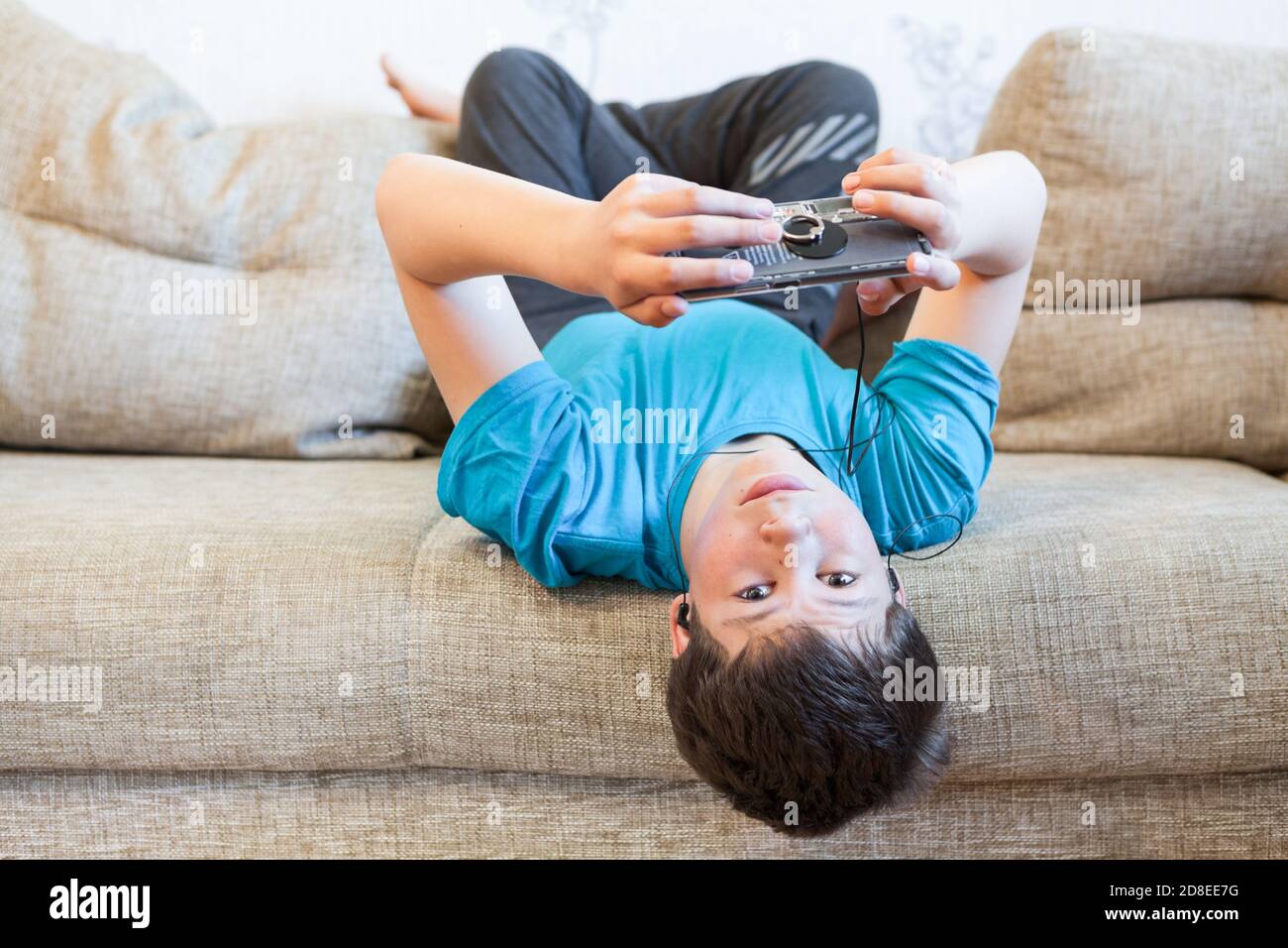 Attractive youngster guy wearing blue t 