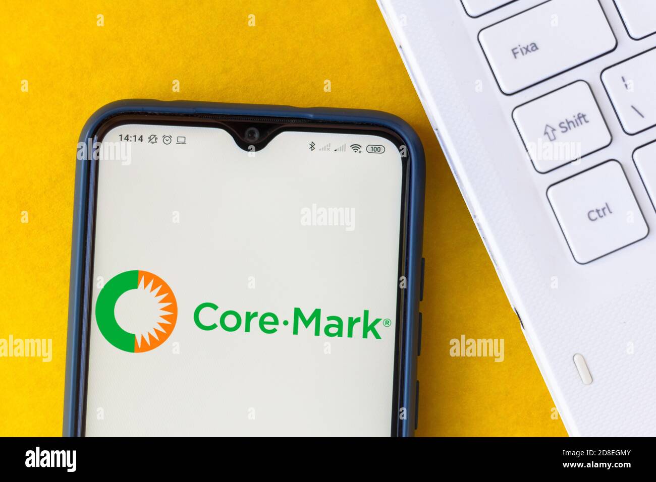In this photo illustration the CoreMark Holding Company logo seen