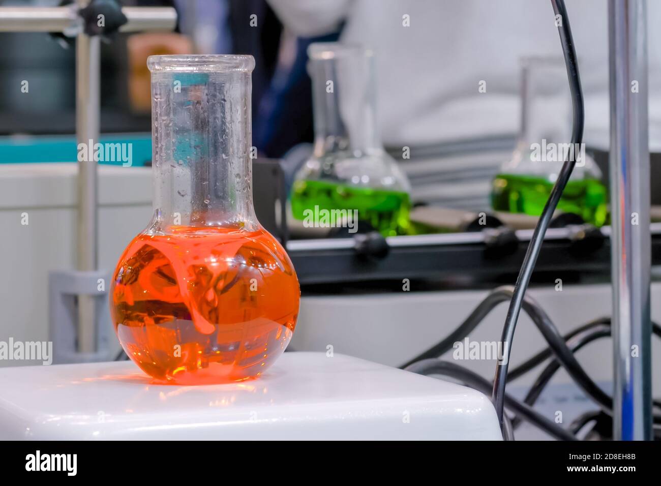 mixer stirrer with fast moving stir bar for mixing liquid at pharmacy factory, medical