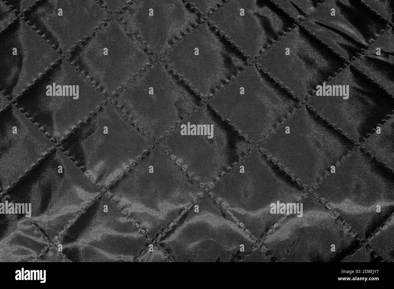shiny silver grey fabric with rhombs texture close up surface Stock Photo