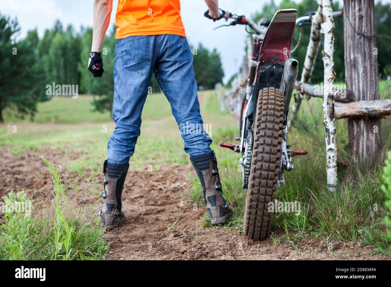 Male motorcyclist is ready for off road riding on off-road motorcycle ...