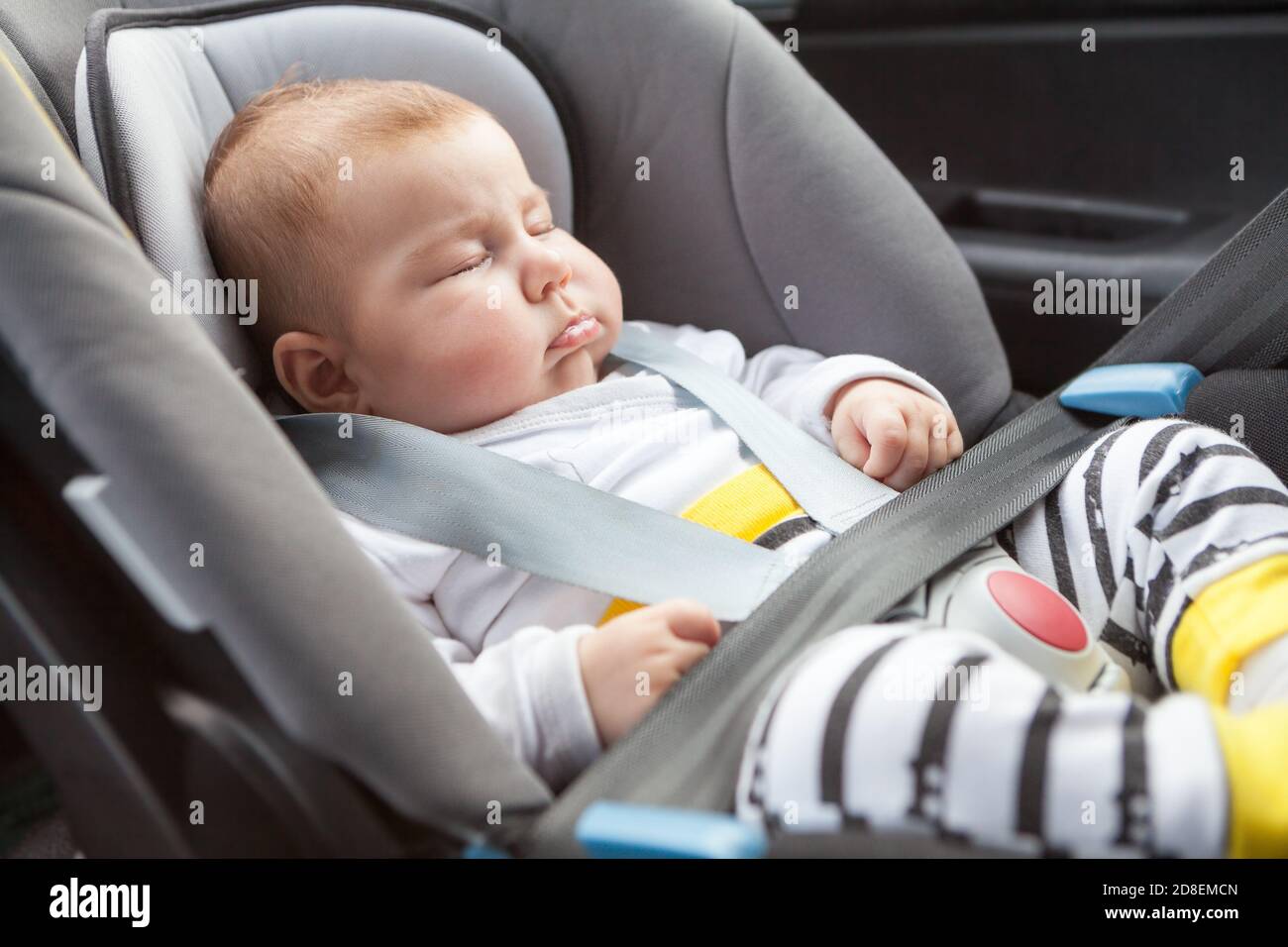 Three months old baby boy in a safety car seat. Safety and security in transport Stock Photo Alamy