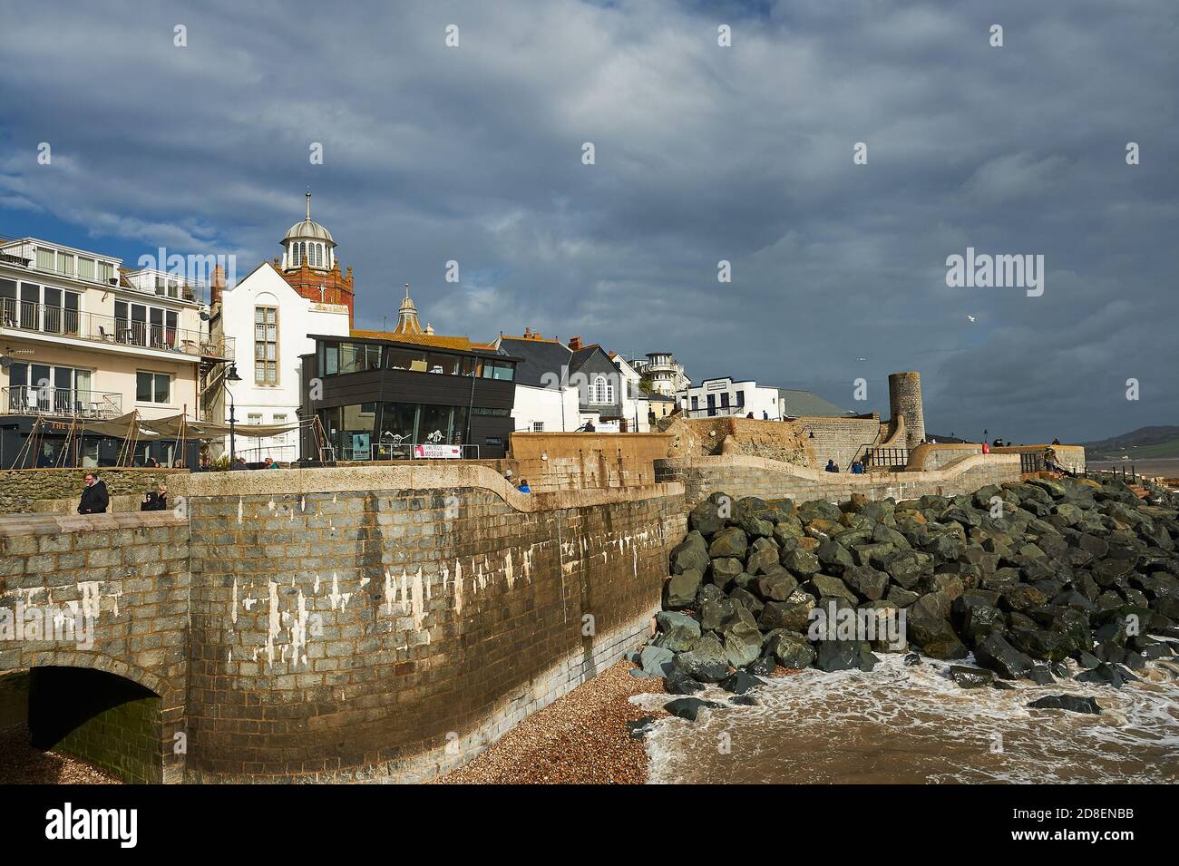 Rock armour sea defences protect the town of Lyme Regis from the intensity of the English Channel Stock Photo