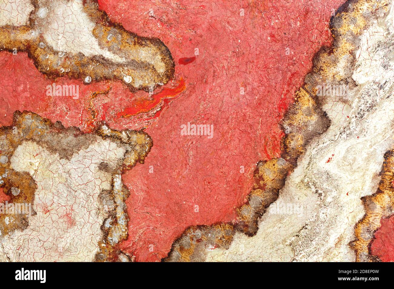 Unusual texture of red granite with brown and beige spots, cracks and ...