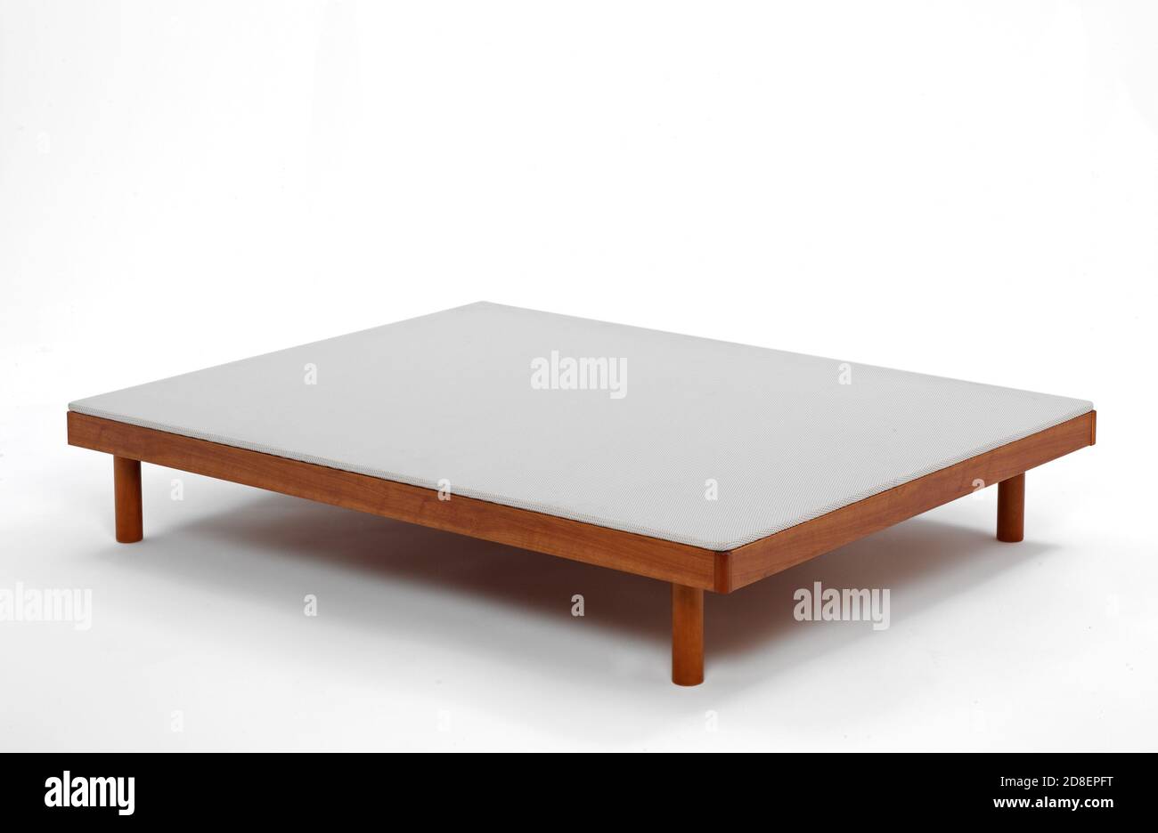 Wooden Bed adjustable. Isolated on a white background. Stock Photo