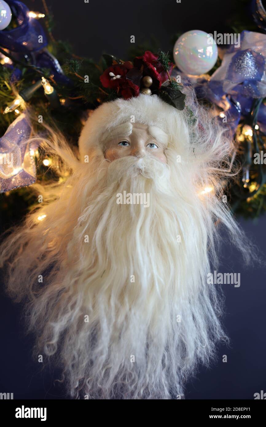 Christmas ornament Santa Clause with white beard denoting celebrating a tradition Stock Photo