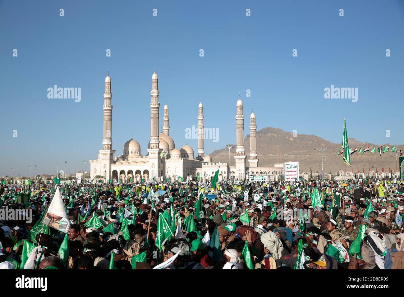 Sanaa, Yemen. 29th Oct, 2020. Houthi rebels and their supporters gather outside Al Saleh Mosque during a celebration marking the anniversary of the birth of Islam's Prophet Muhammad (Mawlid al-Nabi) in Sanaa. Credit: Hani Al-Ansi/dpa/Alamy Live News Stock Photo